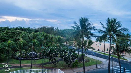 View from our lanai (balcony/porch) at our hotel, looking at Waikiki Beach across the street in the morning. hawaii-waikiki-2